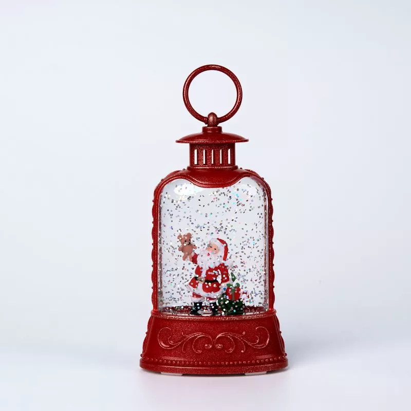 Cluiche Líne Little Red Lantern Santa Snow Globe